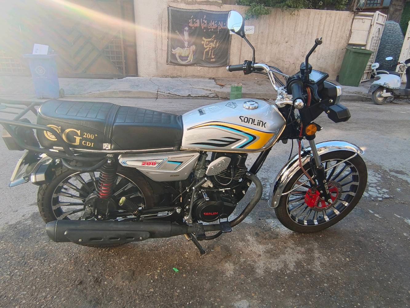 السلام عليكم
دراجه إيراني موديل ٢٦ 
محرك 200cc ضاغطة وزنجيل الدراجه ما ماشيه نضيفة نقص بس مرايات ويدة مال بريك امامي مكسورة إلي بل ستيرن جنت اديرلها دهن موتل والدراجه مكاتبة موجودة  الرقم ***********