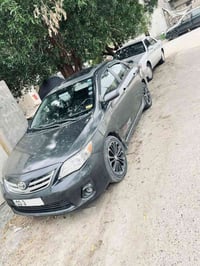 كورلا موديل 2009 فول فتحه تحكم ستيرا اربع جهات شاشا كبيره كامره حساسات...