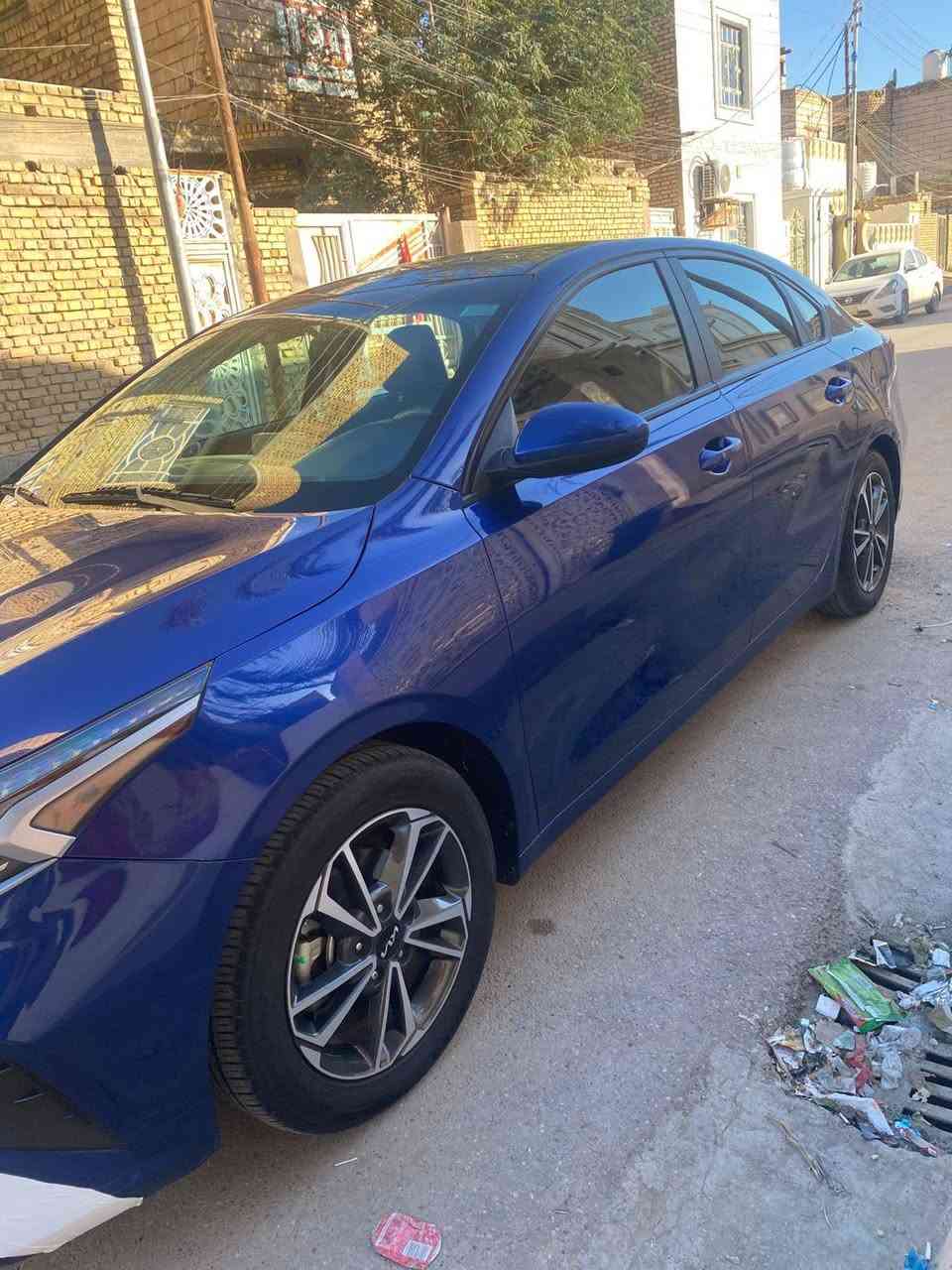 السلام عليكم للبيع فورتي موديل 2023 محرك الفين دوش  السياره كفاله ماعده الجنطه بارد ضربه الوارد السياره جديده حيل معوقين وكاله عامه من المالك نص فول  السياره تخم تاير ويل كب 17 جاهزه للخير مكان ناصريه حي اور *********** السعر 145او بيه مجال
