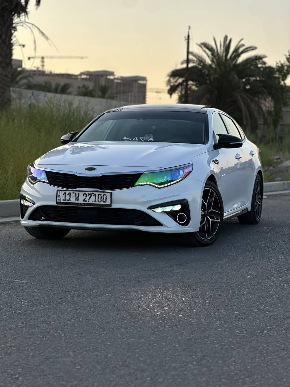 🔥 للبيع الصاروخ | Kia Optima SX 2.0 Turbo 2019 
| أعلى فئة (Full Option)

للبيع كيا أوبتما SX Turbo موديل 2019، أمريكي أعلى فئة السيارة استخدام شخصي ومحافظ عليها جدًا جميع الصيانات بوقتها والسيارة جاهزة   

⚙️ المحرك والأداء

✔️ محرك 2.0 Turbo GDI
✔️ قوة 245 حصان
✔️ عزم 353 نيوتن.متر
✔️ ناقل حركة أوتوماتيك 6 سرعات Sportmatic
✔️ Paddle Shift (بدلات F1 خلف المقود)
✔️ Drive Mode
 (Eco / Normal/ Smart / Sport)
✔️ Steering رياضي يتغير حسب وضعية القيادة
✔️ نظام تعليق SX الرياضي
✔️ دفع أمامي FWD

⸻

🚘 المواصفات الخارجية

✔️ مصابيح LED أمامية كاملة

✔️ عدسات Projector

✔️ LED نهاري DRL

✔️ LED خلفية

✔️ Fog Lights LED

✔️ إضاءة الترحيب عند فتح السيارة 

✔️ مرايا بإشارات LED

✔️ مرايا مدفأة لإزالة الضباب

✔️بانوراما كامله (طكتين) 

✔️ دخول ذكي Smart Key

✔️ تشغيل بصمة

✔️ فتحة سقف بانوراما

✔️ جناح خلفي رياضي

✔️ جنوط رياضية 18 إنج

✔️ حساسات ضغط الإطارات TPMS

⸻

🛋️ المقصورة الداخلية

✔️ مقاعد جلد رياضية SX

✔️ كرسي السائق كهربائي

✔️ كرسي الراكب كهربائي

✔️ تبريد المقاعد الأمامية

✔️ تدفئة المقاعد الأمامية

✔️ تدفئة المقود

✔️ ذاكرة لمقعد السائق

✔️ خزن خلف ظهر المقاعد

✔️ مسند خلفي مع Cup Holders

✔️ مقاعد خلفية قابلة للطي 60/40

✔️ إضاءة داخلية Ambient Light تتغير حسب وضعيات القياده او ثابته تتحكم بيها براحتك 

✔️ إضاءة تفاعلية مع حركة المقود والإشعارات

✔️ مراية وسطية تعتيم أوتوماتيك Auto Dimming

 ✔️ سايد بريك بصمه 

✔️ عدة منافذ USB

✔️ منفذ AUX

✔️ بلوتوث وابل كار بلي واندرويد اوتو 

 ✔️مرأه جانبيه قلابه 
⸻

📺 النظام الترفيه

✔️ شاشة لمس 8 إنج

✔️ Apple CarPlay

✔️ Android Auto

✔️ أوامر صوتية

✔️ كاميرا خلفية بخطوط متحركة

✔️ نظام صوت Harman Kardon Premium

✔️ 12 سماعات مع Amplifier وSubwoofer أصلي

⸻

🛡️ أنظمة الأمان

✔️ رادار المحافظة على المسار Lane Keep Assist

✔️ تنبيه الخروج عن المسار

✔️ رادار النقطة العمياء Blind Spot Detection

✔️ تنبيه حركة السيارات الخلفية Rear Cross Traffic Alert

✔️ رادار الاصطدام الأمامي

✔️ فرملة طوارئ تلقائية

✔️ مثبت سرعة ذكي

✔️ قيادة شبه ذاتية على الخطوط  

✔️ Auto Hold

✔️ Electronic Parking Brake

✔️ ABS

✔️ EBD

✔️ ESC

✔️ Traction Control

✔️ Hill Start Assist

✔️ 6 Airbags

⸻

❄️ التكييف

✔️ Dual Zone Climate Control

✔️ فتحات تكييف خلفية

✔️ فلتر هواء للمقصورة

⸻
التزويد الي على السياره 

✅ Upgraded Intercooler (كولر أكبر)

✅ Racing Fuel Pump

✅ Catch Can

✅ Spectre Cold Air Intake

✅ HKS Blow Off Valve

✅ NGK Iridium Spark Plugs

✅ تفريغ الوسطيات

⸻

✨ مميزات إضافية

✔️ السيارة محافظة عليها جدًا

✔️ استخدام شخصي

✔️ جاهزة للفحص

✔️ لا تحتاج أي مصروف

✔️ رقم مميز (27100)

السياره جاهزه على اخر حبه وترايها للبصره 
والسياره قوية بشكل مو كلام ومصروف عليها متعوب عليها يعني 
ادامه كامله مسويلها 
تخم تاير جديد بريجستون
بطاريه جديدة
السياره متصرف عليها ربع دينار 
ومن ناحيه دوانص انسى شي اسمه دوانص او نوك مابيها نهائييياً 
السياره حادثها 

جاملغ خلفي جهه السايق صبغ فقط بجم السياره كبس شرط 

سعرها 165ومجالها كلش بسيط مكان عامريه بغداد للإستفسار ***********
