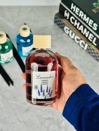 ٢٢٠مل • زجاجة خشبية • ثبات طويل
