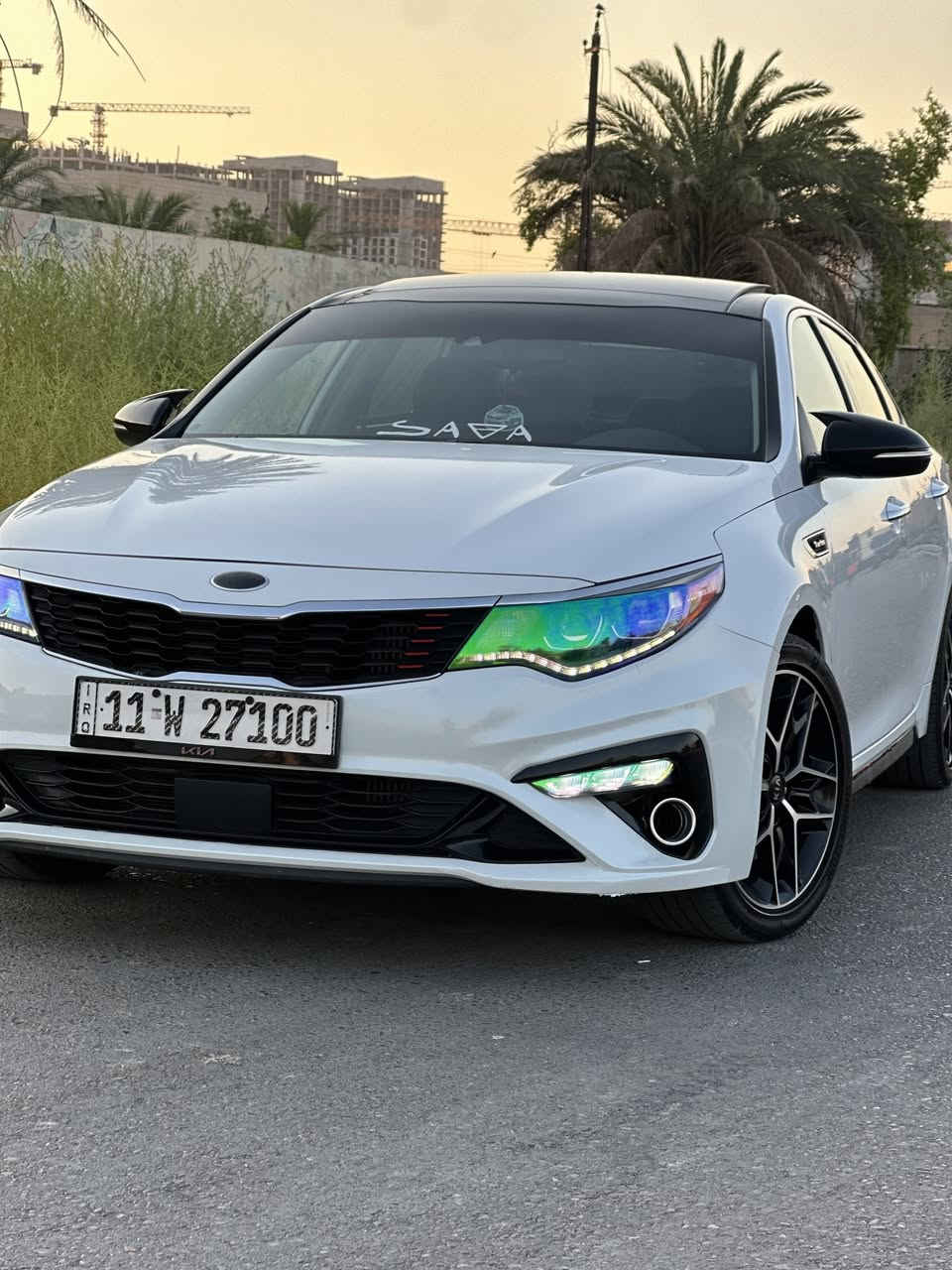 🔥 للبيع الصاروخ | Kia Optima SX 2.0 Turbo 2019 
| أعلى فئة (Full Option)

للبيع كيا أوبتما SX Turbo موديل 2019، أمريكي أعلى فئة السيارة استخدام شخصي ومحافظ عليها جدًا جميع الصيانات بوقتها والسيارة جاهزة   

⚙️ المحرك والأداء

✔️ محرك 2.0 Turbo GDI
✔️ قوة 245 حصان
✔️ عزم 353 نيوتن.متر
✔️ ناقل حركة أوتوماتيك 6 سرعات Sportmatic
✔️ Paddle Shift (بدلات F1 خلف المقود)
✔️ Drive Mode
 (Eco / Normal/ Smart / Sport)
✔️ Steering رياضي يتغير حسب وضعية القيادة
✔️ نظام تعليق SX الرياضي
✔️ دفع أمامي FWD

⸻

🚘 المواصفات الخارجية

✔️ مصابيح LED أمامية كاملة

✔️ عدسات Projector

✔️ LED نهاري DRL

✔️ LED خلفية

✔️ Fog Lights LED

✔️ إضاءة الترحيب عند فتح السيارة 

✔️ مرايا بإشارات LED

✔️ مرايا مدفأة لإزالة الضباب

✔️بانوراما كامله (طكتين) 

✔️ دخول ذكي Smart Key

✔️ تشغيل بصمة

✔️ فتحة سقف بانوراما

✔️ جناح خلفي رياضي

✔️ جنوط رياضية 18 إنج

✔️ حساسات ضغط الإطارات TPMS

⸻

🛋️ المقصورة الداخلية

✔️ مقاعد جلد رياضية SX

✔️ كرسي السائق كهربائي

✔️ كرسي الراكب كهربائي

✔️ تبريد المقاعد الأمامية

✔️ تدفئة المقاعد الأمامية

✔️ تدفئة المقود

✔️ ذاكرة لمقعد السائق

✔️ خزن خلف ظهر المقاعد

✔️ مسند خلفي مع Cup Holders

✔️ مقاعد خلفية قابلة للطي 60/40

✔️ إضاءة داخلية Ambient Light تتغير حسب وضعيات القياده او ثابته تتحكم بيها براحتك 

✔️ إضاءة تفاعلية مع حركة المقود والإشعارات

✔️ مراية وسطية تعتيم أوتوماتيك Auto Dimming

 ✔️ سايد بريك بصمه 

✔️ عدة منافذ USB

✔️ منفذ AUX

✔️ بلوتوث وابل كار بلي واندرويد اوتو 

 ✔️مرأه جانبيه قلابه 
⸻

📺 النظام الترفيه

✔️ شاشة لمس 8 إنج

✔️ Apple CarPlay

✔️ Android Auto

✔️ أوامر صوتية

✔️ كاميرا خلفية بخطوط متحركة

✔️ نظام صوت Harman Kardon Premium

✔️ 12 سماعات مع Amplifier وSubwoofer أصلي

⸻

🛡️ أنظمة الأمان

✔️ رادار المحافظة على المسار Lane Keep Assist

✔️ تنبيه الخروج عن المسار

✔️ رادار النقطة العمياء Blind Spot Detection

✔️ تنبيه حركة السيارات الخلفية Rear Cross Traffic Alert

✔️ رادار الاصطدام الأمامي

✔️ فرملة طوارئ تلقائية

✔️ مثبت سرعة ذكي

✔️ قيادة شبه ذاتية على الخطوط  

✔️ Auto Hold

✔️ Electronic Parking Brake

✔️ ABS

✔️ EBD

✔️ ESC

✔️ Traction Control

✔️ Hill Start Assist

✔️ 6 Airbags

⸻

❄️ التكييف

✔️ Dual Zone Climate Control

✔️ فتحات تكييف خلفية

✔️ فلتر هواء للمقصورة

⸻
التزويد الي على السياره 

✅ Upgraded Intercooler (كولر أكبر)

✅ Racing Fuel Pump

✅ Catch Can

✅ Spectre Cold Air Intake

✅ HKS Blow Off Valve

✅ NGK Iridium Spark Plugs

✅ تفريغ الوسطيات

⸻

✨ مميزات إضافية

✔️ السيارة محافظة عليها جدًا

✔️ استخدام شخصي

✔️ جاهزة للفحص

✔️ لا تحتاج أي مصروف

✔️ رقم مميز (27100)

السياره جاهزه على اخر حبه وترايها للبصره 
والسياره قوية بشكل مو كلام ومصروف عليها متعوب عليها يعني 
ادامه كامله مسويلها 
تخم تاير جديد بريجستون
بطاريه جديدة
السياره متصرف عليها ربع دينار 
ومن ناحيه دوانص انسى شي اسمه دوانص او نوك مابيها نهائييياً 
السياره حادثها 

جاملغ خلفي جهه السايق صبغ فقط بجم السياره كبس شرط 

سعرها 165ومجالها كلش بسيط مكان عامريه بغداد للإستفسار ***********
