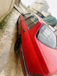 نيسان صني موديل 1992  اللون احمر غير محدد  كير ومحرك شرط (مال كصه )  ط...