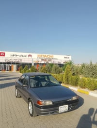 مازدا 323 • مازدا 1991 • سيارة مازدا 323 • مازدا كاربريتر • مازدا سبوغ...