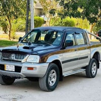 ميتسوبيشي L200 • 2004 • فورويل اتوماتيك