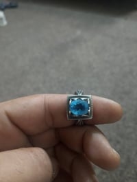 خاتم فضة • توباز أزرق • قياس ٢٢/٢١