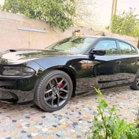 دوج جارجر موديل 2023  GT  امريكي حادث قطعه وحده صبغ جاملغ خلفي السياره...