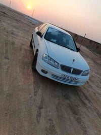 ٢٠٠٢ • محرك ١٨٠٠ • أبيض