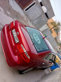 اخوان سياره كيا اوبتيما وأرد امريكا 2008 ضررها باب السايق فقط من امريك...