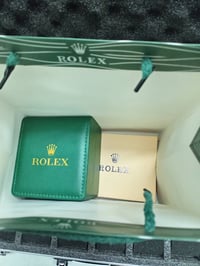 رولكس جي ام تي • بيبسي • محفظة جلد