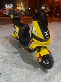 دراجه شحن أيبو. من(مؤيد طياره) بطاريه _ليثيوم 50 امبير تقطع  مسافه 100...