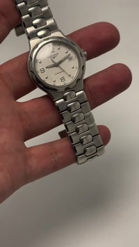 لونجین کونکویست • كوارتز • قطر ٣٦مم