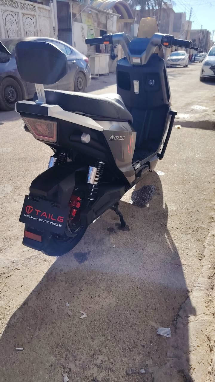 سلام وعليكم دراجه شحن قويه بصمه  اسويج تشغيل عن بعد اسمهة TAILG اقوه واحسن نوعيه بل سوك بس اعتازيت فلوس الدراجه بيهة وصف شراء كله كامل ماخذه 1300 من معرض كلشي وكلاشي بل صدريه السعر البيع مليون الدراجه جديده بعدهة المكان بغداد البياع رقم الهاتف ***********
