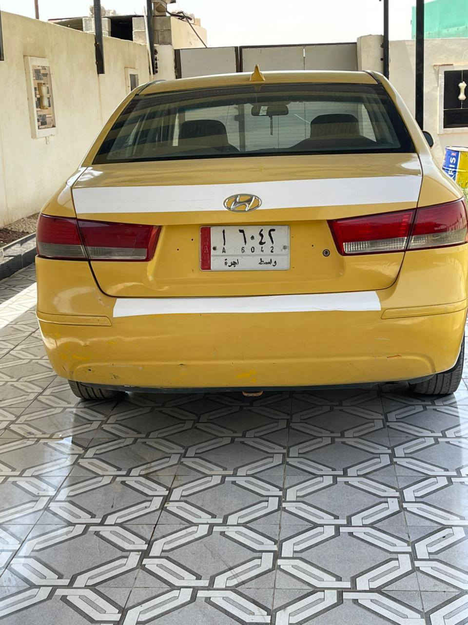 السلام عليكم سوناتا تكسي خطها بغداد عزيزيه خليجي مكفولة من الدعمه والتبديل بسمي سعرها ٩٥بيها مجال قليل رقم تلفون ***********
