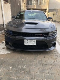 جارجر للبيع sxt مواصفات نص فول سياره مال جناي جداً نضيفه مكفول كير ومك...