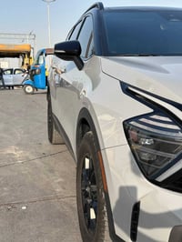 للبيع فقط بدون مراوس  وارد امريكي  Kia sportage xpro 2024   لون سمنتي ...