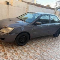 لانسر ٢٠١٠ • محرك ١٦٠٠ • رقم بغداد دولي