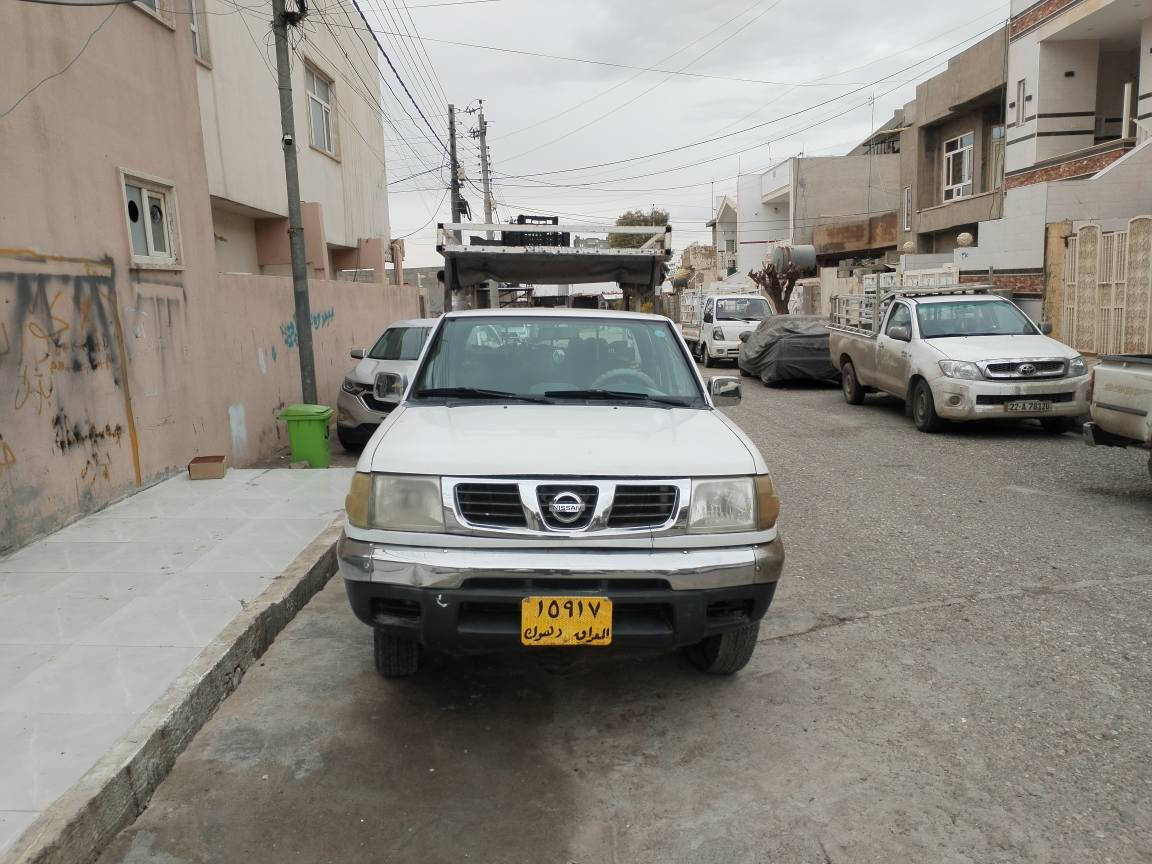 ‎پیکاب نیسان 2002 تەبرید پاوەر تەقەورەقە بەشەرت***********‎ أربيل, العراق
