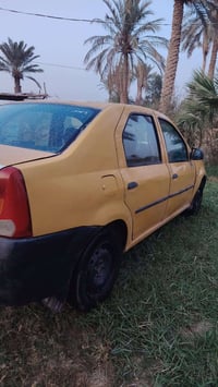 لوجان ٢٠١٠ • محرك وجير شرط • رقم بغداد انجليزي