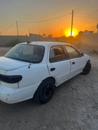 كيا سيفيا موديل ١٩٩٥محرك مسكر كير عادي محرك بي صرف بسيط رقم بغداد بسمي...