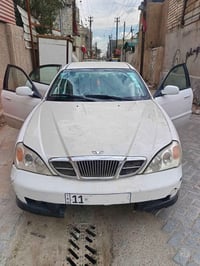 امراوس بافيو صفره كير عادي شوفرليت ابيكا 2006 رقم بغداد انكليزي باسمي ...