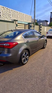 كيا سيراتو 2013 شكل 2014 لون نفطي قطعتين تبريد 5 ويل كب مري شفط  بجم ز...