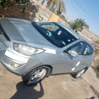 توكسان ٢٠١١بسمي رقم أربيل لون صدفي السنويه ٢٠٢٨...07824837184