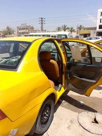 سياره طيبه موديل 2015السياره باسمي رقم بغداد انكليزي غرامات عليه السعر...