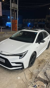 كورلا 25 S ماشية 8 الاف اخت زيرو   رقم بغداد باسمي   سيارة فول مواصفات...