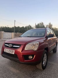 سبورتج 2009 خليجي محرك 2000  بدون صبغ ماشيه 118 رقم بغداد باسمي السعر ...