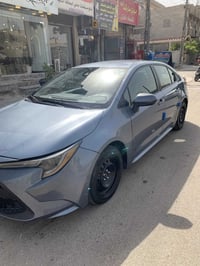 كورلا ٢٢ وارد امريكي ماشيه ٥٥ رقم بغداد باسمي نص فول سيارة جاهزة وجديد...