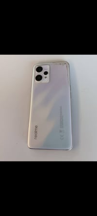 ريلمي ٩ • ذاكرة ١٢٨ • ظهر متضرر