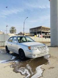 اكسنت • ٢٠٠٥ • اوتماتيك