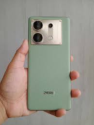 هاتف Infinix Zero 30 5G باللون الأخضر هو هاتف ذكي يعمل بنظام أندرويد. 
يتميز بشاشة AMOLED منحنية بحجم 6.78 بوصة ومعدل تحديث 144 هرتز.
يعمل بمعالج MediaTek Dimensity 8020.
يحتوي على كاميرا خلفية رئيسية بدقة 108 ميجابكسل وكاميرا أمامية بدقة 50 ميجابكسل.
يأتي بسعة تخزين داخلية تبلغ 256 جيجابايت.
يحتوي على بطارية بسعة 5000 مللي أمبير تدعم الشحن السريع بقوة 68 واط.
للبيع او مراوس 
سعر مطلوب 250 وبي مجال


**إذا كنت صاحب هذا الإعلان وتريد حذفه لأي سبب، رجاءا أرسل رسالة إلى الدعم الفني**