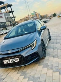 كورلا امريكي موديل 2023فول موصفات se بيها بنيد وجاملغ بارد رقم بغداد ا...