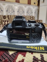 Nikon D3100 • عدسة 55-200 • مع حقيبة وبطارية
