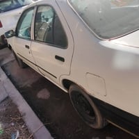 نيسان صني • ١٩٩٧ • رقم انكليزي بغداد