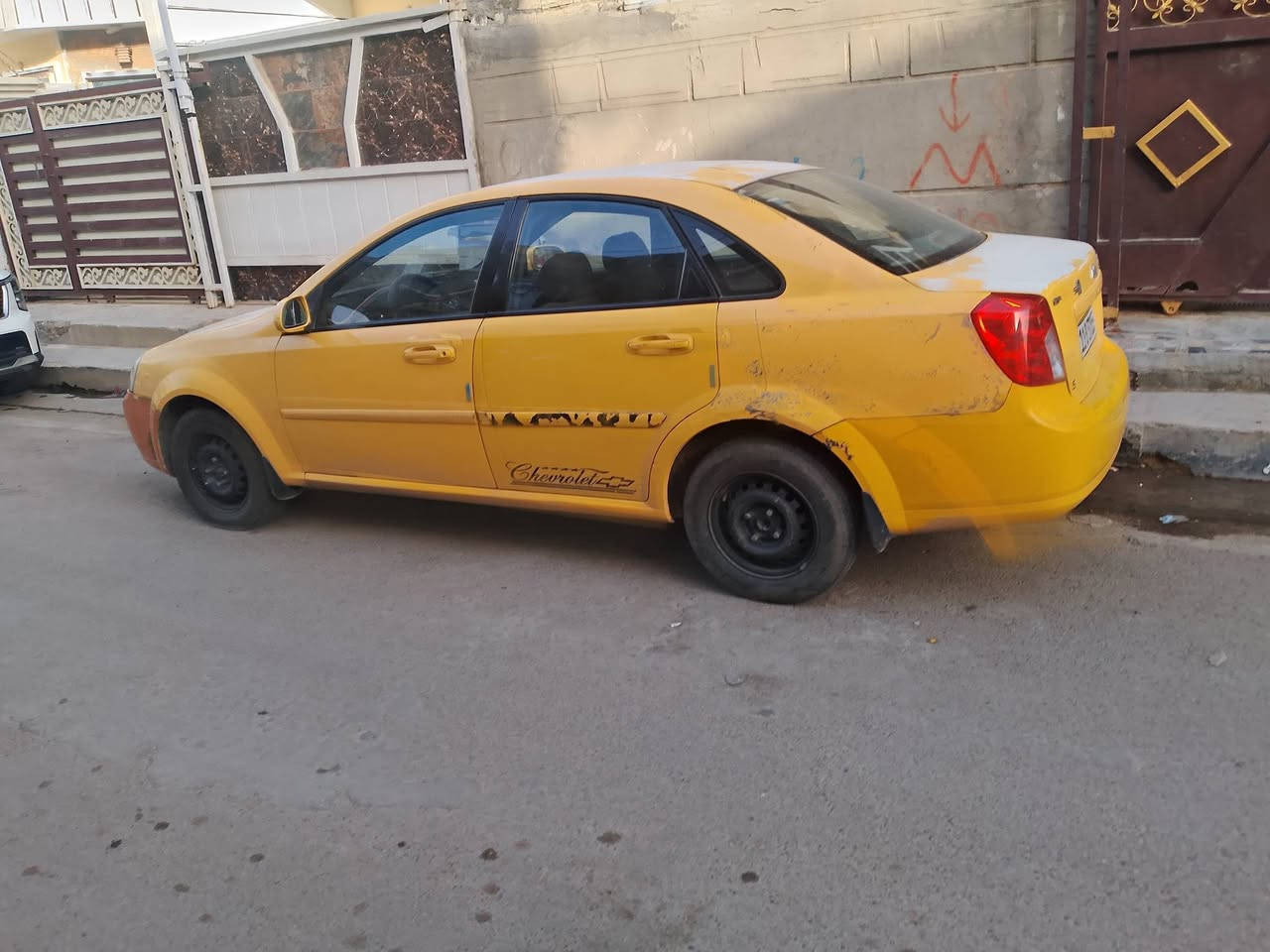 سلام وعليكم اوبترا موديل 2010عنوان بغداد حي الجامعه الرقم *********** بيه جاملغ  المامي عكس السائق مبدل ول باب وره السائق مبدل السعر 62 وبيه مجال الطيبين وبيه ضربه بل جاملق الخلفي مثل مامضح بل صوره
