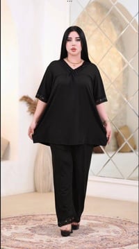 فانيلة زبدة • سواد فاحم • فري سايز