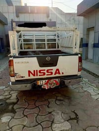 من رخصة الادمن المحترم...بيكب نافارا موديل 9 رقم بغداد الجديد بأسمي  ت...