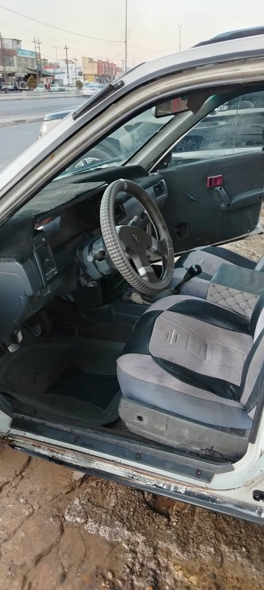 نيسان صني موديل 1989 سنويه عظم بسمي شرط الوكاله والتحويل كابون بنزين بيها جديد  لا صرف ولا نفخ كير محرك شرط تواير جدد ما يعوزها شي سعر 18 وبيها مجال ؛ رقم *********** واتساب موجود
