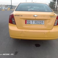 اوبتره موديل 2012 رقم انكليزي بغداد  كير عادي  مصفره هيئه وغرامات  مكي...