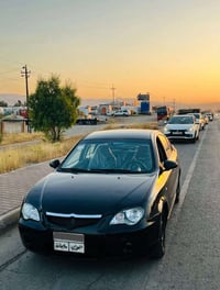 بروتون ٢٠١١ • جير عادي • بدون صبغ