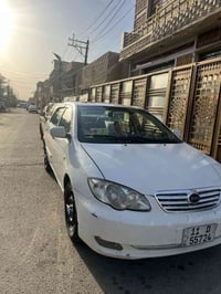 BUD f3 2012 ابيض خصوصي  كير ومكينه لانسر المرغوب 1600  السياره بيها من...
