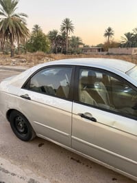 اسبكترا موديل ٢٠٠٩ رقم بغداد گير مكينة٢٠٠٠ كفالة تبريد تدفئة بيها قطع ...