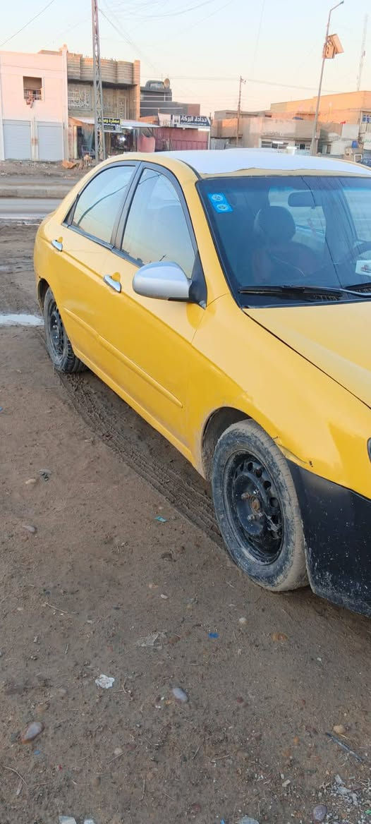 سلام عليكم  كيا سبكترا للبيع 2009 سيارة جاهزه كير محرك صدر تبريد كهربائيات تايرات باتري كله تمام حادثهه جاملغ خلف السائق والبنيد طاير عله الجامه وبيهه معجون بدايه القماره لاشواصي ولاتكم رقم انبار وبسمي مكانهه ```بغداد``` التاجي سبع البور سعر 68 هاتف ***********
