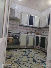 نجف حي الجزيرة • ٩٠م • غرفتين