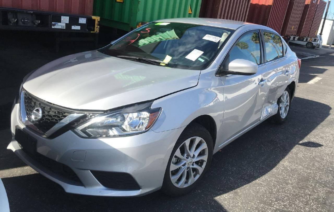 نيسان سنترا 19
فئه sv معروفه مواصفاته 
الممشى 96 الف كيلو 
الحادث مثل مموضح بالصوره وهنا بالعراق صار بيه شخط بين الباب والچاملغ الخلفي اثر دحچه 
السعر ١٢٥
***********
