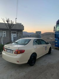 كورولا ٢٠١٠ • مشى ٩٥٠٠٠ • السليمانية