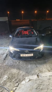 كورلا 2022 هايبرد  رقم انبار دولي تحويل مباشر  مبدل بيها قطعتين بنيد و...